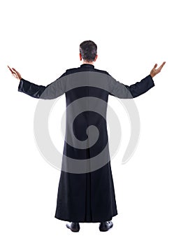 Full length priest blessing arm rear view