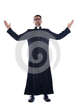 Full length priest blessing open arms