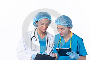 Full length Professional physician Doctor stand in hospital uniform discuss patient chart condition on Tablet. Woman Practitioner
