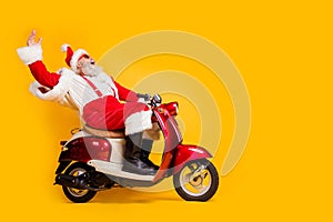 Full length profile side photo of crazy funky white bearded santa claus hipster ride fast his scooter hurry on christmas