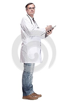 full-length. qualified doctor with clipboard. isolated on a white