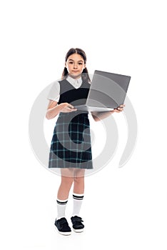 Full length of schoolkid in skirt