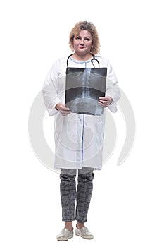 full length. senior female doctor with x-ray.