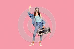 Full length size body studio portrait of cheerful vintage straight long legs hairstyle holding old school radio in hand