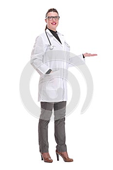 Full length of smiling medical doctor woman with stethoscope