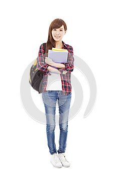 Full length smiling university student girl standing