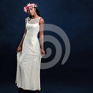 Beautiful young african bride in white wedding dress.