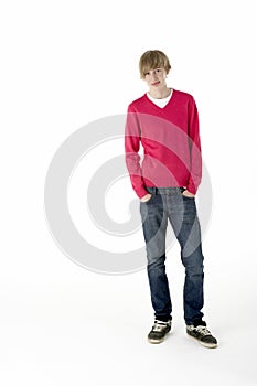 Full Length Studio Portrait Of Teenage Boy