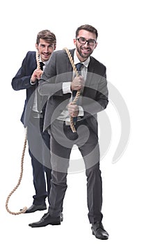 Full length . two businessmen pulling a long rope.