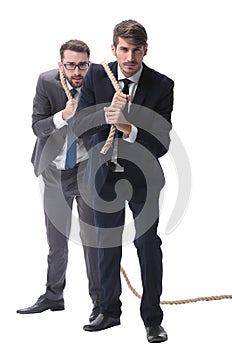 Full length . two businessmen pulling a long rope.