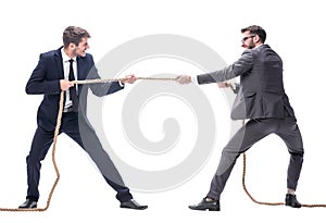 full length . two smiling businessmen pulling the rope.