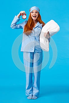 Full-length vertical studio attractive excited and happy cheerful upbeat girl in nightwear woke up energized in morning