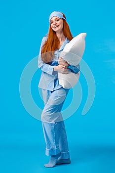 Full-length vertical studio cheerful lovely caucasian woman with ginger red long hair in nightwear, pyjama and sleep