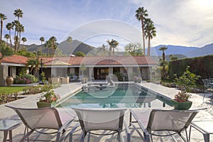 Full length view of pool in luxury house