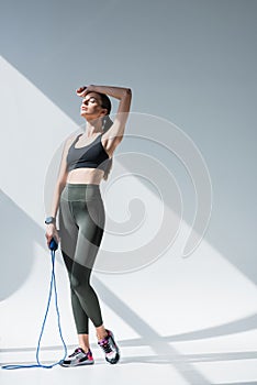 full length view of sporty young woman