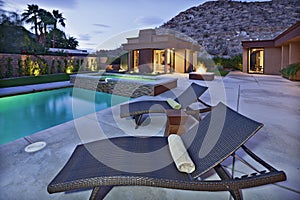 Full length view of Sun lounges by the pool