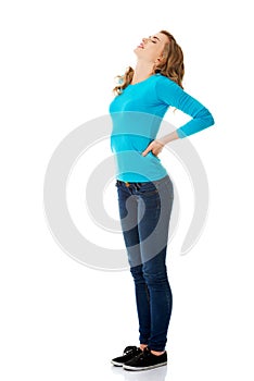 Full length woman with back pain