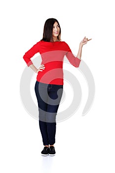 Full length woman pointing to the right