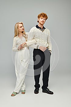 full length of young couple in photo