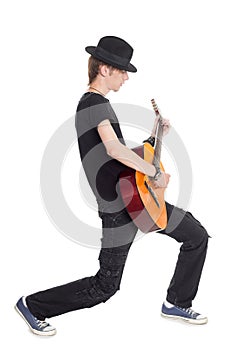 Full length of young man playing guitar