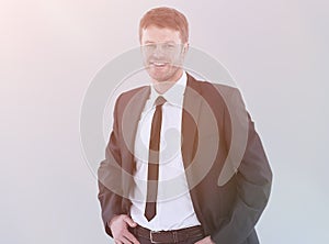 Handsome young business man standing on white background