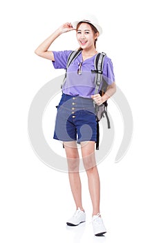 Full length of young woman in casual walking with the travel bag