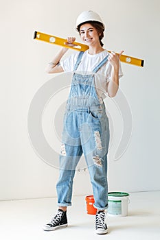 Full-lenth image of smiling woman with