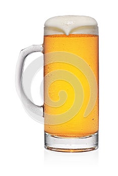 Full misted mug of yellow beer isolated on white