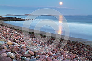 Full moon at the atlantic ocean