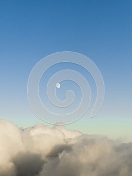 Full moon on the blue sky in the the winter time