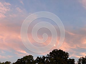 Full moon in a cloudy sky