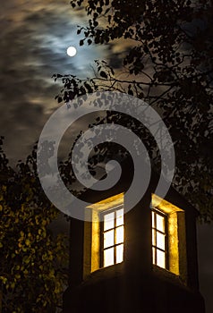 Full moon, dramatic night sky, lantern