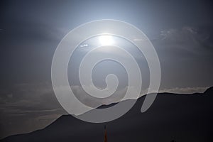 Full moon and grand mountain uludag silhouette at middle of the night