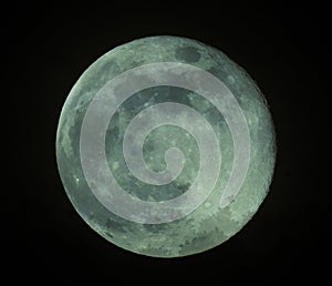 Full moon with green overlay