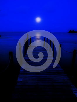 Full moon on a jetty