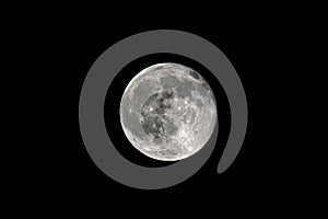 Full moon is the lunar phase when the Moon appears fully illuminated from Earth\'s perspective. Full moon on a cloudless