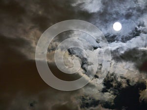 full moon at night clouds sky