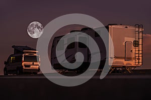 Full Moon Night in a RV Park and Parked Recreational Vehicles