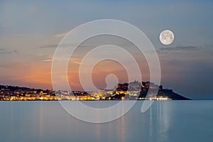 Full moon over Calvi citadel in Balagne region of Corsica