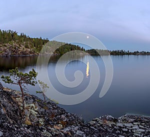 The full moon over lake Ladoga. Karelia. Russia