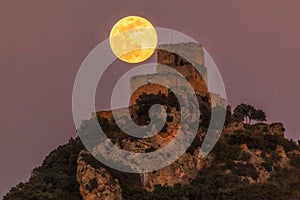 Full moon over Ocio castle photo