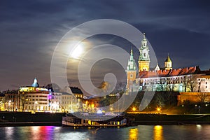 Full moon over Wawel Castle in Krakow, Poland