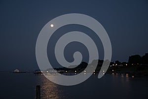 Full moon reflected onto the waters of the might Rappahannock River