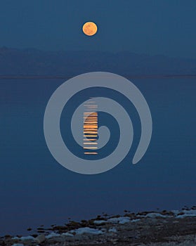 Full moon & reflection on salton sea
