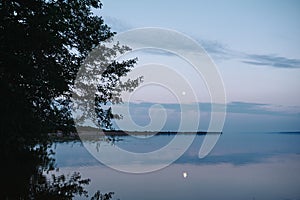 full moon rising over the river