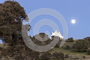 Full moon in a rural landscape of Castro, Verde, in the Alentejo, Portugal photo