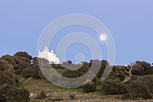 Full moon in a rural landscape of Castro, Verde, in the Alentejo, Portugal