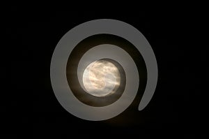 Full Moon Series: Full moon with misty clouds against the night sky