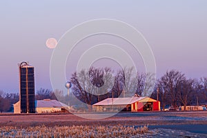 Full Moon Setting Over a Farm Yard