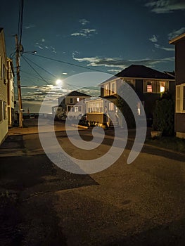 Full Moon Shines on Street